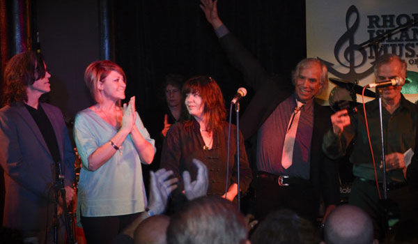 Cowsills accepting induction award