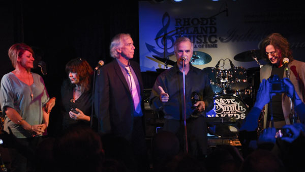 Cowsills accepting induction award