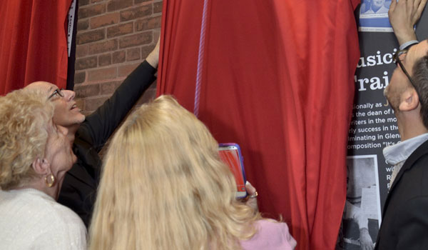 Family members unveiling Jimmie Crane