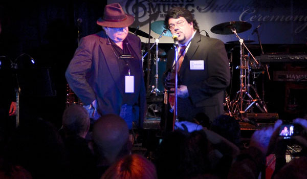Russell Gussetti inducting Paul Geremia